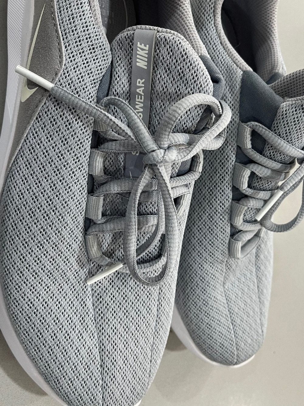 Gray/White Nike Sneakers.  7.5